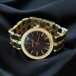 Mark Naimer gold and black rhinestone accent watch
